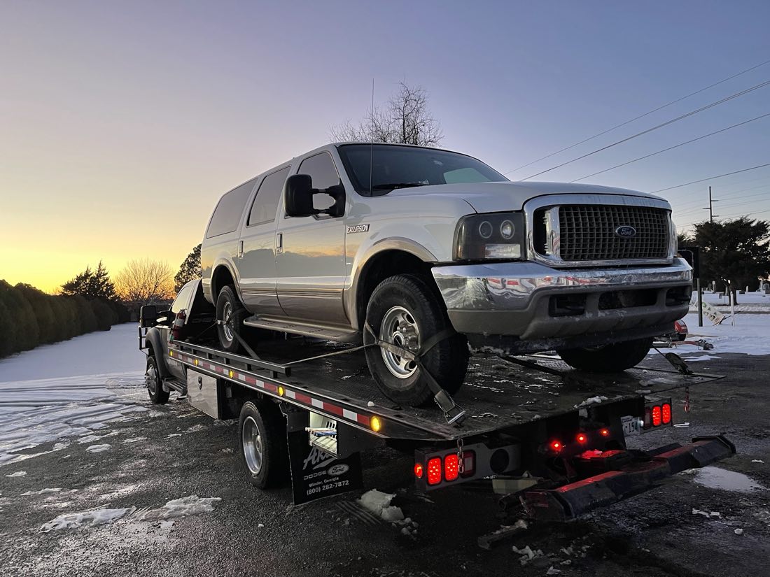 Best Towing & Recovery flatbed tow truck